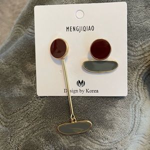 asymmetrical earrings